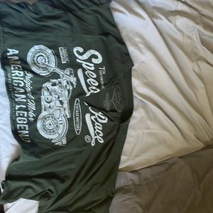 Obsessive love, dark green crop top.